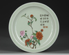 A CHINESE FAMILLE ROSE CELADON-GROUND DISH, 19TH-20TH CENTURY