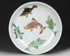 A CHINESE FAMILLE VERTE FISH DISH, 19TH-20TH CENTURY