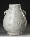 A CHINESE CARVED HU-FORM VASE, QING DYNASTY (1644-1911)