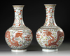 A PAIR OF CHINESE FAMILLE ROSE BOTTLE VASES, 20TH CENTURY
