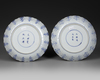 A PAIR OF CHINESE BLUE AND WHITE 'HUNTING' DISHES, KANGXI PERIOD (1662-1722)