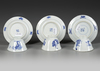 THREE CHINESE BLUE AND WHITE CUPS AND SAUCERS, KANGXI PERIOD (1662-1722)