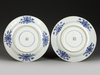 A PAIR OF BLUE AND WHITE SCHOLARS PLATES, KANGXI PERIOD (1662-1722)