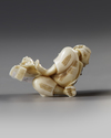 A JAPANESE OKIMONO OF A DREAMING MAN HOLDING A SCROLL, 19TH CENTURY