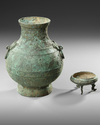 A CHINESE BRONZE RITUAL HU VASE, HAN DYNASTY OR LATER