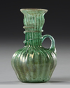 A PERSIAN GLASS EWER, 12TH-13TH CENTURY