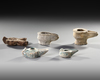 FIVE SELJUK POTTERY OIL LAMPS, SELJUK 12TH/13TH CENTURY