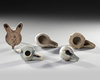 FIVE SELJUK POTTERY OIL LAMPS, SELJUK 12TH/13TH CENTURY