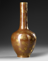 A CHINESE BROWN-GROUND GILT-DECORATED BOTTLE VASE, QING DYNASTY (1644-1911)