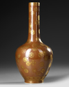 A CHINESE BROWN-GROUND GILT-DECORATED BOTTLE VASE, QING DYNASTY (1644-1911)