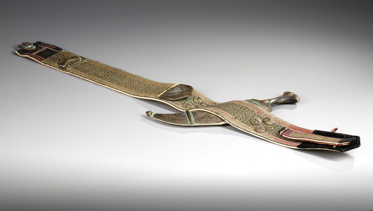 A CURVED DAGGER OR JAMBIYA, LEATHER SHEATH WITH EMBROIDERED BELT, YEMEN EARLY 20TH CENTURY
