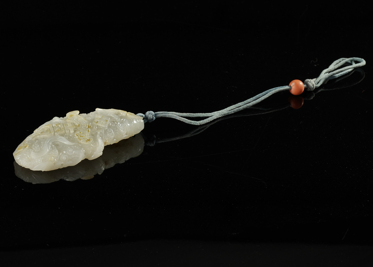 A CHINESE WHITE JADE CLOUD PENDANT, QING DYNASTY (1644-1912)