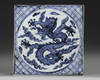 A CHINESE BLUE AND WHITE DRAGON TILE, 20TH CENTURY