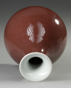 A CHINESE COPPER-RED GLAZED PEAR-SHAPED VASE, 19TH CENTURY