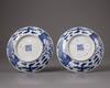 A PAIR OF CHINESE BLUE AND WHITE 'PHOENIX' DISHES, QING DYNASTY (1644-1911)