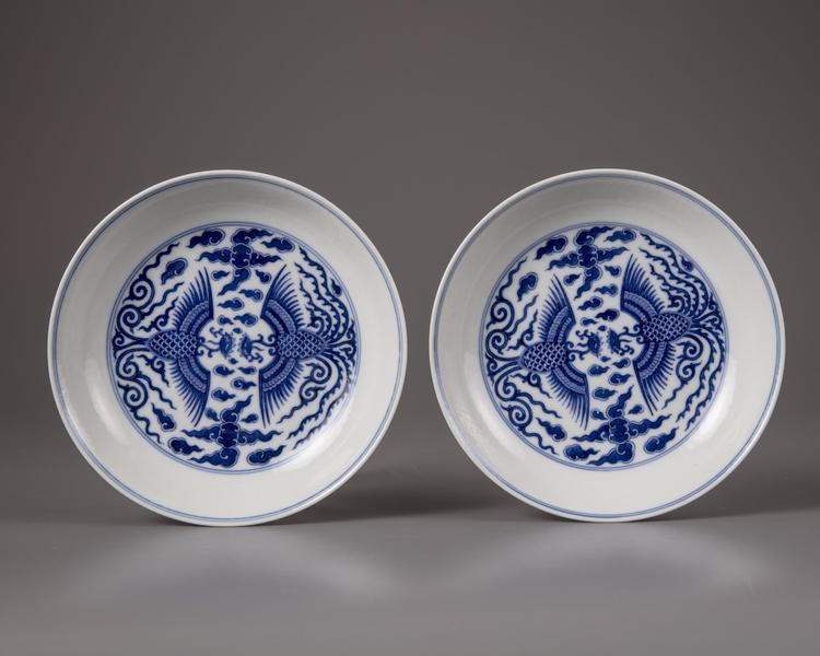 A PAIR OF CHINESE BLUE AND WHITE 'PHOENIX' DISHES, QING DYNASTY (1644-1911)
