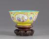 A CHINESE YELLOW-GROUND MEDAILLON BOWL, 20TH CENTURY