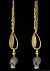 A LARGE PAIR OF GRECO-ROMAN GOLD EARRINGS WITH GARNET AFRICAN HEADS, 2ND CENTURY BC-1ST CENTURY AD