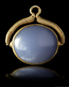 AN ACHAEMENID BLUE CHALCEDONY SEAL IN GOLD MOUNT, 5TH CENTURY BC