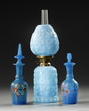 A GROUP OF TWO OPALINE BOTTLES AND AN OIL LAMP MADE FOR THE PERSIAN ISLAMIC MARKET, FRANCE, 19TH CENTURY