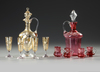 TWO BOHEMIAN LIQUOR SETS ATTRIBUTED TO MOSER, CIRCA 1880-1900