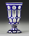 A BOHEMIAN OVERLAY GLASS GOBLET, CIRCA 1860