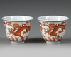 A PAIR OF CHINESE IRON-RED DRAGON DECORATED CUPS, QING DYNASTY (1644–1911)