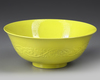 A CHINESE LEMON-YELLOW-ENAMELED BOWL, QING DYNASTY (1644–1911)