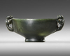A CHINESE CARVED SPINACH-GREEN JADE BOWL, 18TH-19TH CENTURY