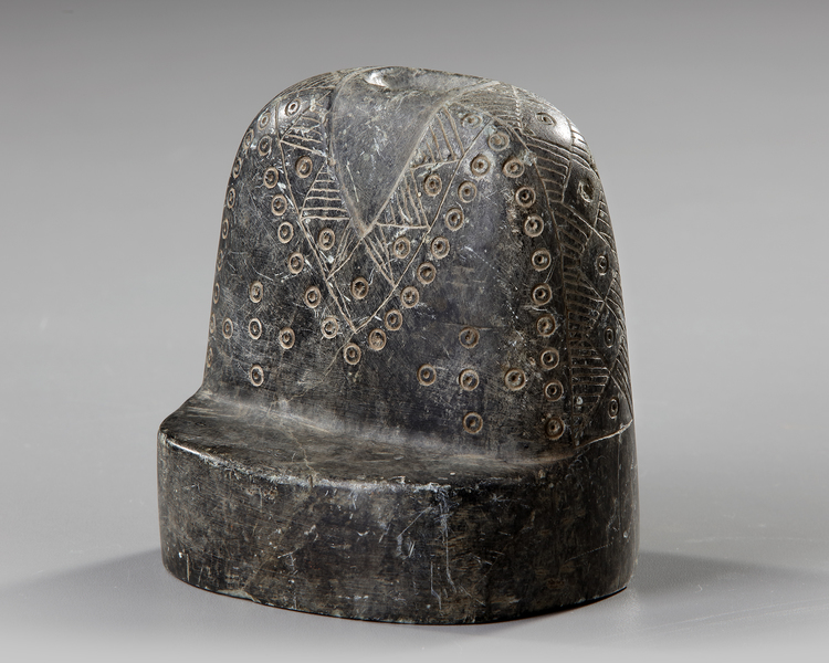 A GREEN ALABASTER PLANK IDOL, 2ND MILLENNIUM BC