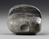 A GREEN ALABASTER PLANK IDOL, 2ND MILLENNIUM BC