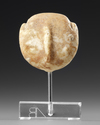 A HEAD OF A MARBLE IDOL, KILIYA TYPE, WESTERN ASIATIC, CIRCA 2700-2400/2300 BC
