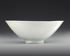 A FINELY CARVED QINGBAI 'BOYS' CONICAL BOWL, SONG DYNASTY (960–1279)
