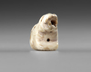 A LION AMULET IN SHELL, CIRCA 3500 BC