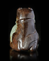 A CHINESE SPINACH CARVED JADE FU DOG, MING DYNASTY (1368-1644)