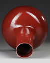 A LARGE CHINESE RED GLAZED BOTTLE VASE, 19TH-20TH CENTURY