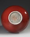 A LARGE CHINESE RED GLAZED BOTTLE VASE, 19TH-20TH CENTURY