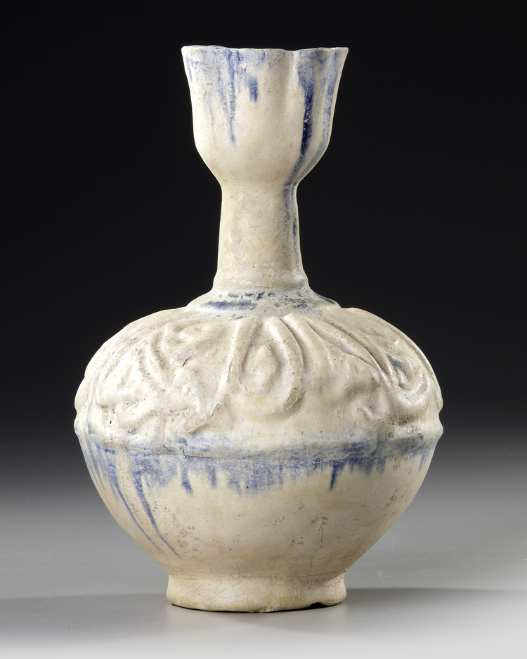 A Kashan Moulded Bottle Vase Persia 12th Century