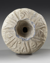 A KASHAN MOULDED BOTTLE VASE, PERSIA, 12TH CENTURY