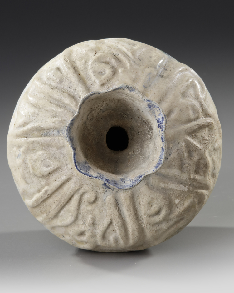 A Kashan Moulded Bottle Vase Persia 12th Century