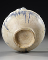 A KASHAN MOULDED BOTTLE VASE, PERSIA, 12TH CENTURY
