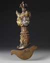 A BRONZE BUDDHIST PHURBA, POSSIBLY NEPALESE, EARLY 20TH CENTURY
