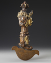 A BRONZE BUDDHIST PHURBA, POSSIBLY NEPALESE, EARLY 20TH CENTURY