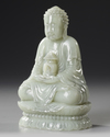 A CHINESE CARVED JADE SEATED BUDDHA, QING DYNASTY (1644–1911)