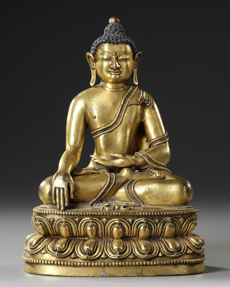A CHINESE GILT- BRONZE FIGURE OF SHAKYAMUNI BUDDHA,  QING DYNASTY (1644–1911)