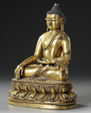 A CHINESE GILT- BRONZE FIGURE OF SHAKYAMUNI BUDDHA,  QING DYNASTY (1644–1911)
