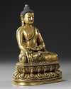 A CHINESE GILT- BRONZE FIGURE OF SHAKYAMUNI BUDDHA,  QING DYNASTY (1644–1911)