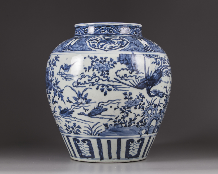 A large blue and white pot
