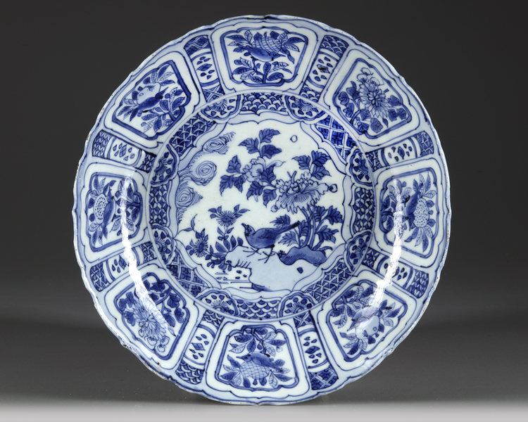 A CHINESE BLUE AND WHITE 'BIRD' 'KRAAK PORCELAIN DISH, WANLI PERIOD ...