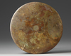 A CHINESE BRONZE CIRCULAR MIRROR WITH ANIMALS, SONG DYNASTY (960-1279) OR LATER